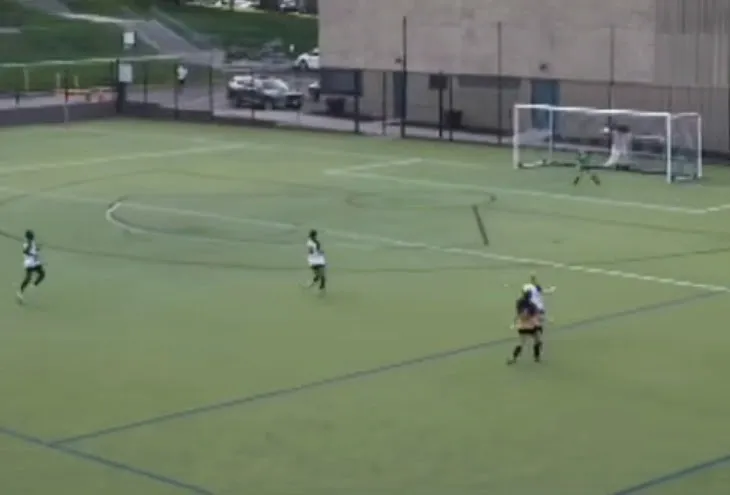 Mackenzie Dimarco chips the KC Courage goalkeeper from distance