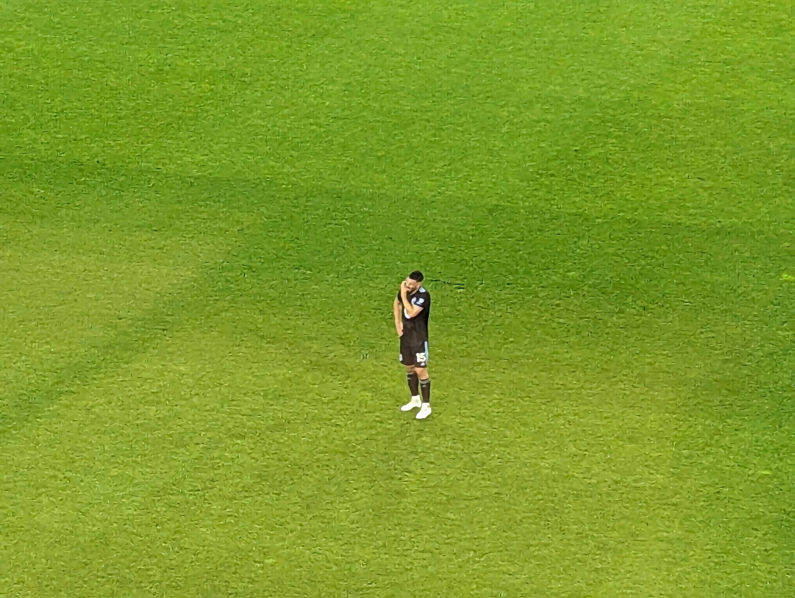 Michael Boxall stands alone on the Allianz Field pitch scratching his head.